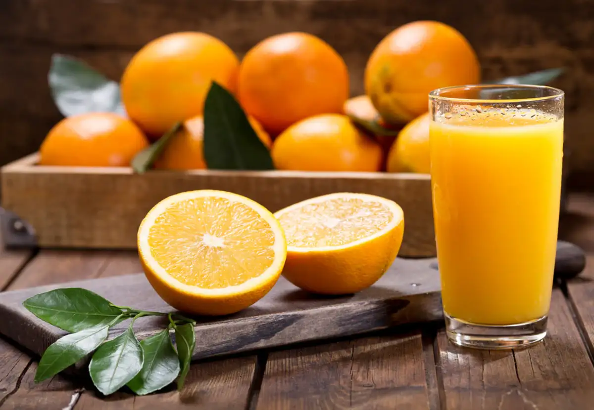 oranges and glass of orange juice